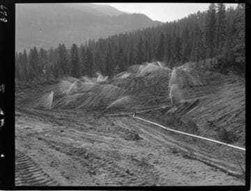 Big Creek - Mammoth Pool - Watering operation in Borrow Area No. 2