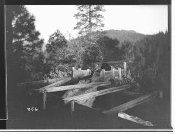 Pipe joining a flume