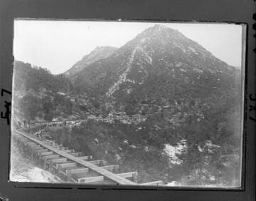 The flume at Tule Hydro Plant where it leaves the P.G. & E. power house at Wishon Forks.  At that time