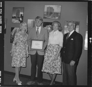 Conservation award presented to Tooley & Company