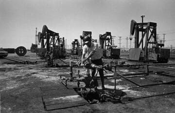 Oil field worker, drill rig set-up, and an energized electric substation