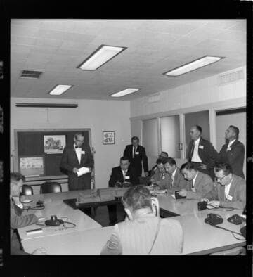 Group touring steam plant construction, service center, switchyard, Edison General Office