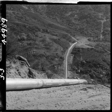 3-3 Tule Siphon - View of piplines from half way up outlet slope to center ridge