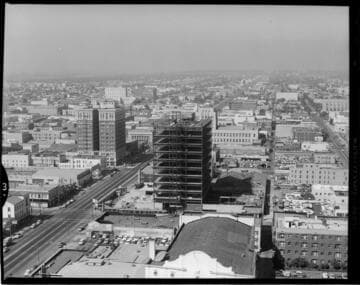 Aerial views of downtown Long Beach and Edison's Long Beach Regional Office during construction