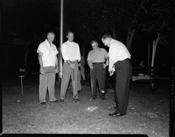 Golf foursome on the tee