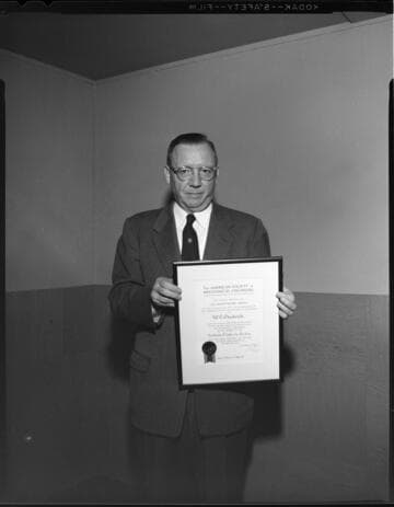 W. L. Chadwick with award from American Society of Mechanical Engineers