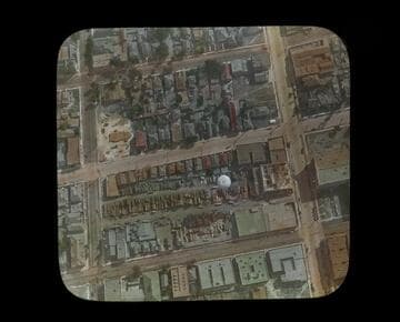 Aerial view over lumberyard, possibly Pasadena