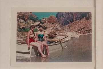Lois Ross (wearing red shorts); Elaine Frost (green shorts).  Students at Denver University.  Short distance below Express Train Rapid section.  San Juan River.  Frost second trip