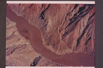 Mile 195 in Cataract Canyon.  Preliminary gauge:  29,700 cfs