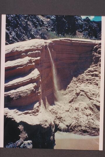 Sand fall from dune below Monument Creek