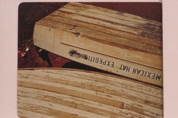 The "Mexican Hat Expedition" aluminum motor boat showing the battering imposed by some rocky navigation.  The craft was in Wright's yard at Blanding