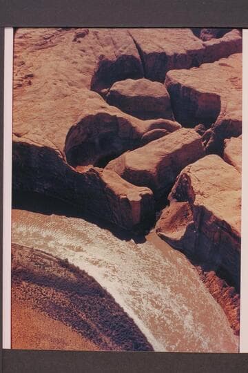 Side canyon in Glen Canyon at Mile 34.4; left bank.  Approx. gauge:  31,000 cfs
