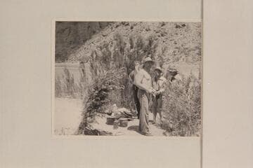 The crew of the "Esmeralda II" trying to force down some of the paste breakfast at camp in lower Grand Canyon:  Edward Hudson, Robinson, Marston and Taylor