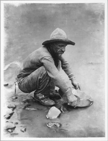 Placer miner on the Colorado River near Lee’s Ferry