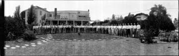 Group portrait of men at a clubhouse