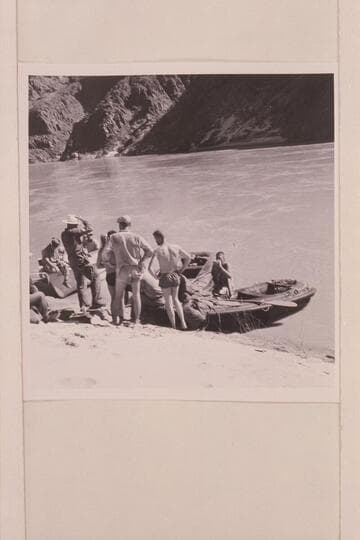 Part of the Gibbs party and their rafts and some of our crew.  Jack; Smuss; Harry; Doug.  Canyon City, Mile 238 3/4