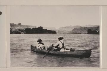 George C. Fraser and Bert Loper in one of Dave Rust's boats during Glen Canyon traverse