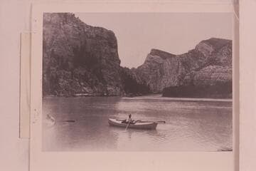 The Kolb boats on Green River.  Identified by Emery Kolb as Flaming Gorge.  The scene is below Flaming Gorge and just below Sheep Creek near the head of Hideout Park or Hideout Flat