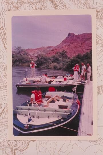 The three Bureau of Reclamation TurboCraft and crew at the dock at Lees Ferry prior to departure.  Buzz Belknap is in the foreground.  Bill Gardner, Jim Jordan, Dock Marston, Jim Bechtel, and Earl Komie