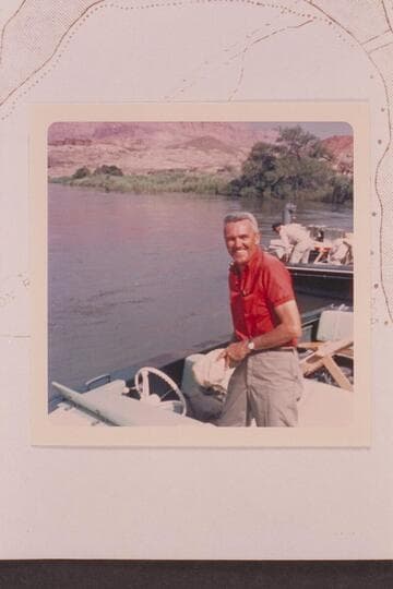 Bob Littleton during preparation for departure from Lees Ferry.  Jim Jordan in the background