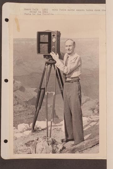 Emery Kolb with Pathe movie camera taken down the river in 1911