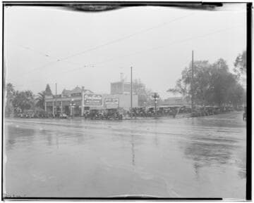 View of southeast corner of Colorado and Madison showing used car lot, 590 East Colorado, Pasadena. 1924