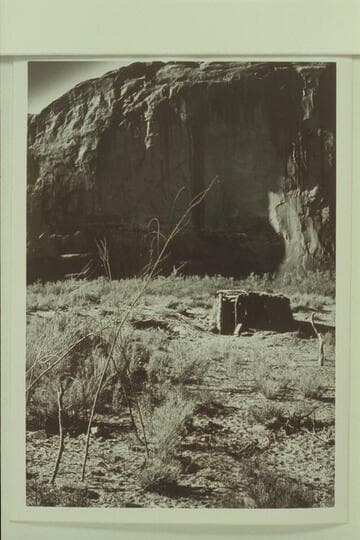 Framework of shade at lower left; summer hogan right center. Mile 35.3, east side