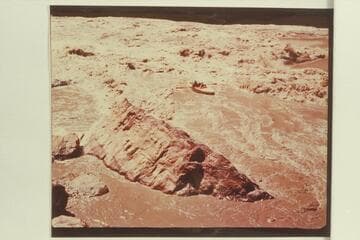 The "Susie R" at the end of the tongue at Boulder Narrows. Print sent by Reilly. Preliminary gauge: 122,000 cfs