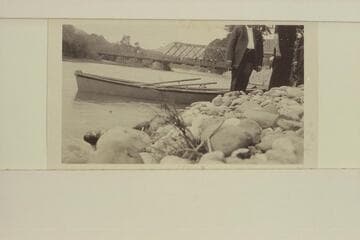 The "LiVingston, Mont."--open steel skiff used by Lewis R. Freeman on Yellowstone. Captioned: "We Launched the Boat Below the LiVingston Bridge."